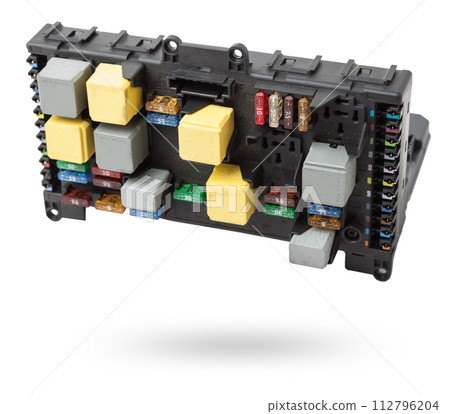 Metallic car engine control unit with plastic elements soaring on a white isolated background is connecting center of various subsystems, units and assemblies. Spare part. 112796204