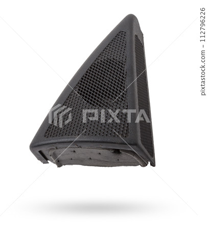 speaker of an acoustic system - an audio for playing music in a car interior on a white isolated background in a photo studio. Spare parts for auto repair in a workshop or for sale for tuning 112796226