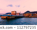 Moji Port retro drawbridge bathed in the setting sun 112797235