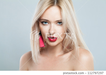Attractive blonde model woman portrait. Facial treatment, cosmetology, skin care concept 112797297