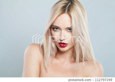 Beautiful blonde model woman portrait. Facial treatment, cosmetology, skin care concept 112797299