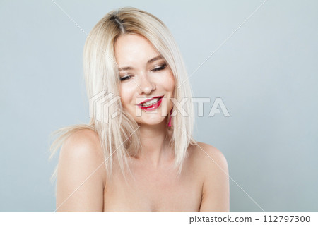 Beauty portrait of blonde model woman. Facial treatment, cosmetology, skin care concept 112797300