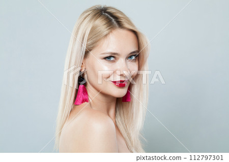 Excited blonde model woman portrait. Facial treatment, cosmetology, skin care concept 112797301