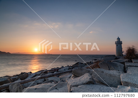 Sunset and lighthouse Sunset and lighthouse 112797680