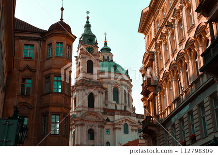 View on the lesser town with saint Nicholas church in Prague city View on the lesser town with saint Nicholas church in Prague city 112798309
