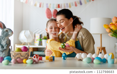 family preparing for Easter family preparing for Easter 112798683