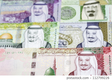 Saudi riyal a business background Saudi riyal a business background 112799226