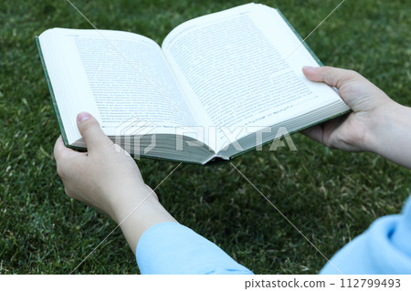Books on the grass in the park Books on the grass in the park 112799493