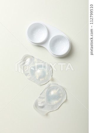 Contact lenses for eyes with a container for their storage Contact lenses for eyes with a container for their storage 112799510