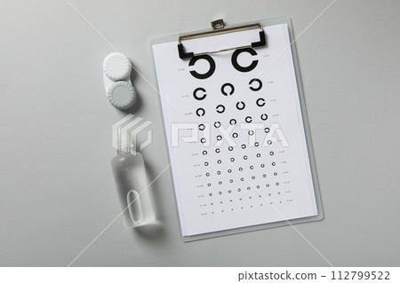 Contact lenses with accessories and a sight test plate 112799522