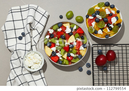 Healthy food and healthy nutrition concept - fruit salad 112799554