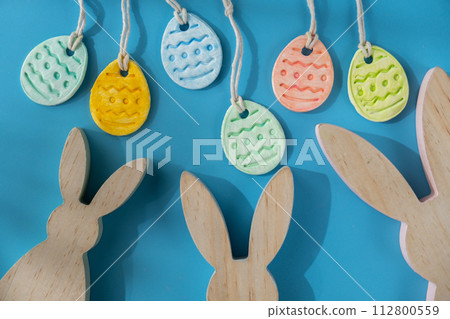 Do it yourself air dry clay crafts for Easter holiday. Decoration gift idea Handmade children craft. Step by step instruction of painting, pressing figures Do it yourself air dry clay crafts for Easter holiday. Decoration gift idea Handmade children craft. Step by step instruction of painting, pressing figures 112800559