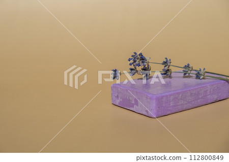 Handcrafted purple lavender soap with lavender flowers. Natural hydrating moisturiser softness cosmetic. Organic calming beauty skincare product. Herbal self care wellness alternative soap 112800849