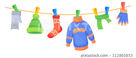 Drying laundry. Clothes hanging on rope with clothespin 112801653