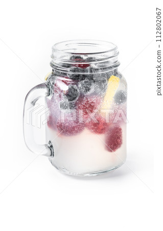 Fresh berry drink with blueberries and raspberries and lemon isolated on white background 112802067