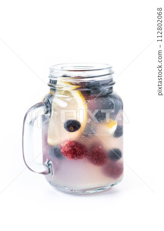 Fresh berry drink with blueberries and raspberries and lemon isolated on white background 112802068