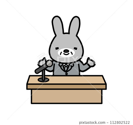 商人般的兔子角色在講台上演講 商人般的兔子角色在講台上演講 112802522