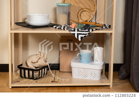 Modern kitchen wooden shelf and kitchenware 112803228