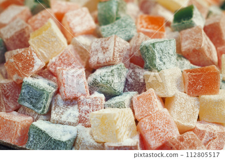 turkish delight or lokum of red, green, orange and yellow colors. 112805517