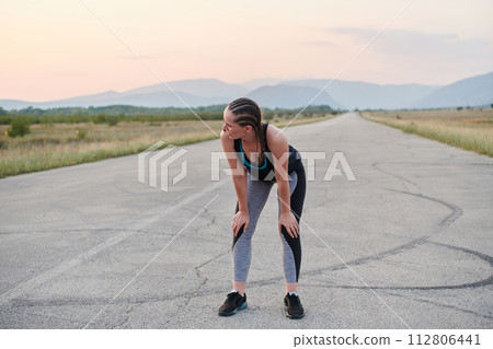Close-Up Portrait of Determined Athlete Resting After Intense Workout Close-Up Portrait of Determined Athlete Resting After Intense Workout 112806441