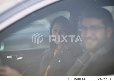 A romantic couple embarks on a scenic road trip across Europe, exploring captivating landscapes and creating unforgettable memories together A romantic couple embarks on a scenic road trip across Europe, exploring captivating landscapes and creating unforgettable memories together 112806503