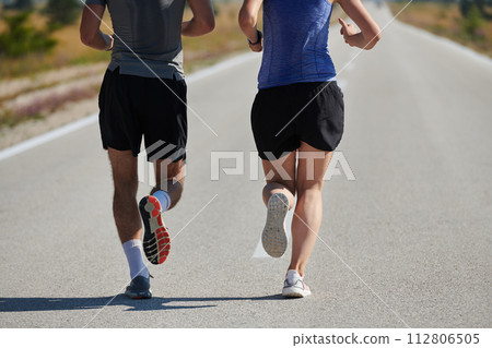 Dynamic Duo: Fitness-Ready Couple Embraces Confidence and Preparation for Upcoming Marathons Dynamic Duo: Fitness-Ready Couple Embraces Confidence and Preparation for Upcoming Marathons 112806505