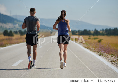 Dynamic Duo: Fitness-Ready Couple Embraces Confidence and Preparation for Upcoming Marathons Dynamic Duo: Fitness-Ready Couple Embraces Confidence and Preparation for Upcoming Marathons 112806854