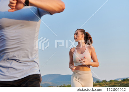 Focused Stride: Close-Up Capture of Intensely Running Athlete. Focused Stride: Close-Up Capture of Intensely Running Athlete. 112806912