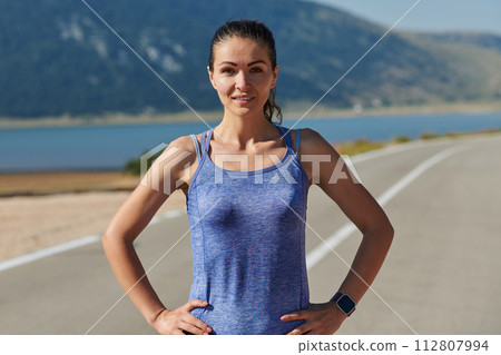 Close-Up Portrait of Determined Athlete Resting After Intense Workout 112807994