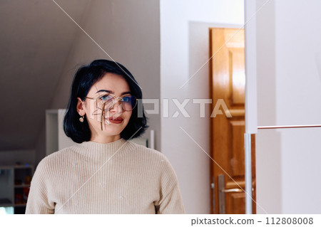 Young Woman Captured in a Beautiful Moment with Her Stick Insect (Medauroidea Extradentata) 112808008