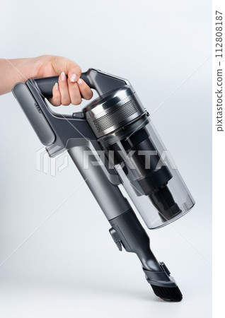 Wireless vacuum cleaner in clean floor 112808187