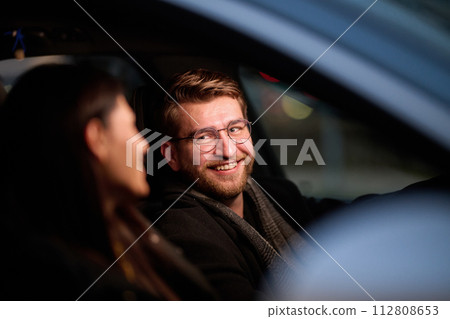 A romantic couple embarks on a scenic road trip across Europe, exploring captivating landscapes and creating unforgettable memories together 112808653