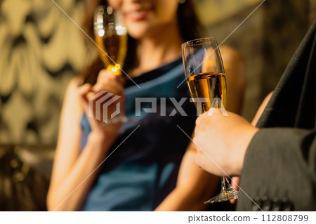 Couple drinking champagne Couple drinking champagne 112808799