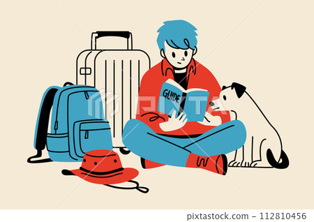 A man and his pet looking at a guidebook while traveling 112810456