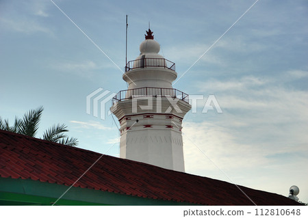 Photo of the white banten royal tower object, with a blue sky background Photo of the white banten royal tower object, with a blue sky background 112810648