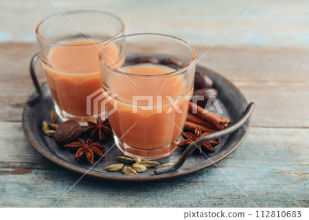 Traditional indian drink - masala tea Traditional indian drink - masala tea 112810683