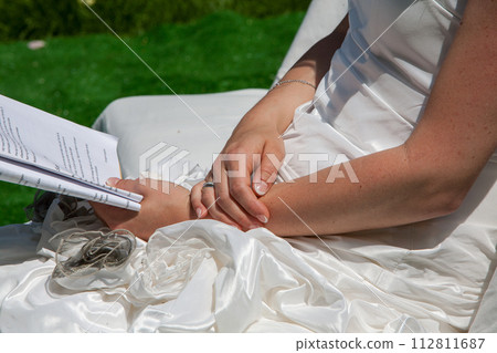 Bridal Serenity: A Quiet Moment with Wedding Notes 112811687