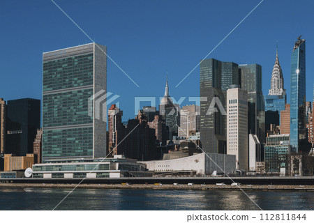 United Nations Building View on a Clear Blue day, Midtown Manhattan skyline, New York City 112811844