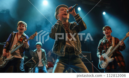 Young Boy Band Performing on Stage 112812006