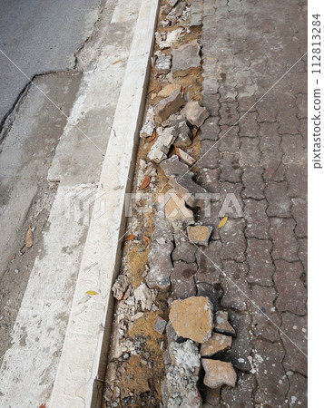 The footpath way is broken from the erosion. 112813284