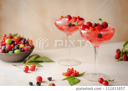 Glass of berry cocktail 112813857