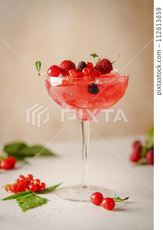 Glass of berry cocktail 112813859