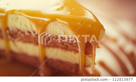 a mouthwatering close-up shot of a slice of freshly baked cake dripping with decadent jam ganache 112813977