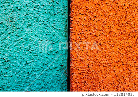 Texture of cyan and orange background, half two colors, macro. Black line in between. Texture of cyan and orange background, half two colors, macro. Black line in between. 112814033