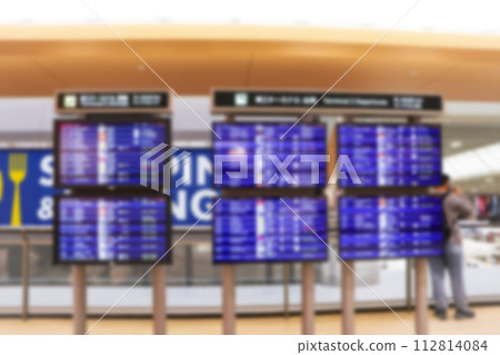 Blurred image of Boarding time monitor screens timetable boards for departures monitors to check status of flight on airport. Abstract background textures. 112814084