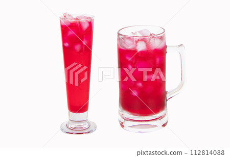 Red nectar in big size glass isolated on white background. Drink refresh body. Summer sweet iced drink red in glass tall drink, refreshed. Red nectar quenches thirst, Water is mixture of red and sugar 112814088
