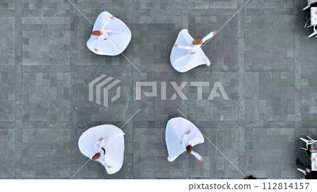 Mevlevi. Sufis spinning outdoors.Spinning Dervish 112814157