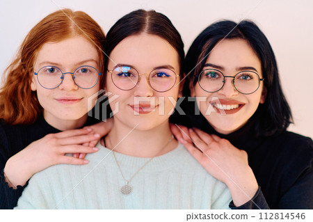 Sisters United: A Portrait of Family Love and Bonding on White Background 112814546
