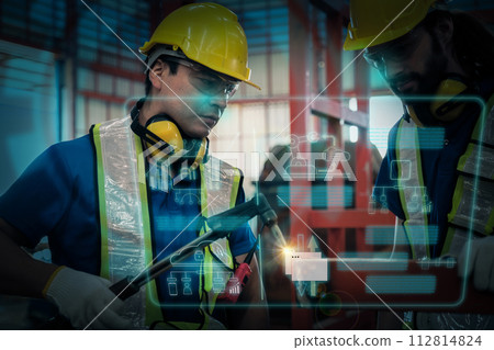 Team of engineers working at the factory 112814824