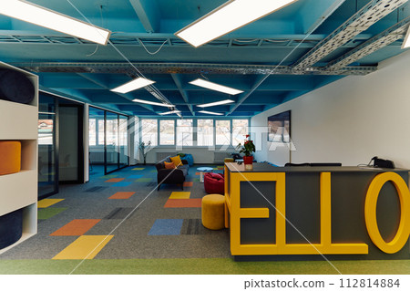 Photo of a modern office where programming, digital marketing and web design projects are done. Office with modern furniture and glass office 112814884